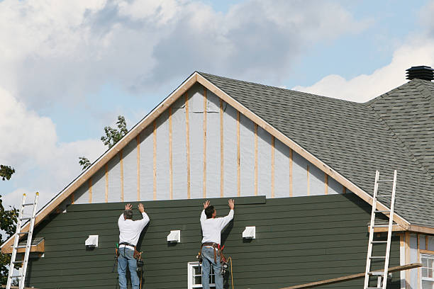 Professional Siding technician working in Little Orleans, MD